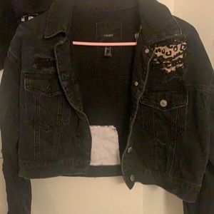 Cropped black denim jacket with leopard accents